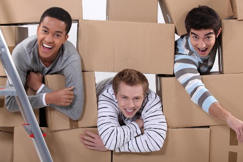 Professional removal services in Wandsworth with moving van and packed boxes