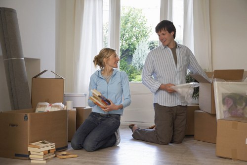 Professional movers handling furniture in a Wandsworth property