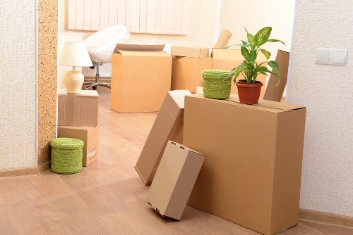 Professional removals team handling furniture during a Wandsworth house move