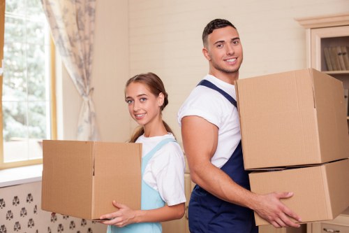 Movers handling furniture carefully during a Wandsworth house removal